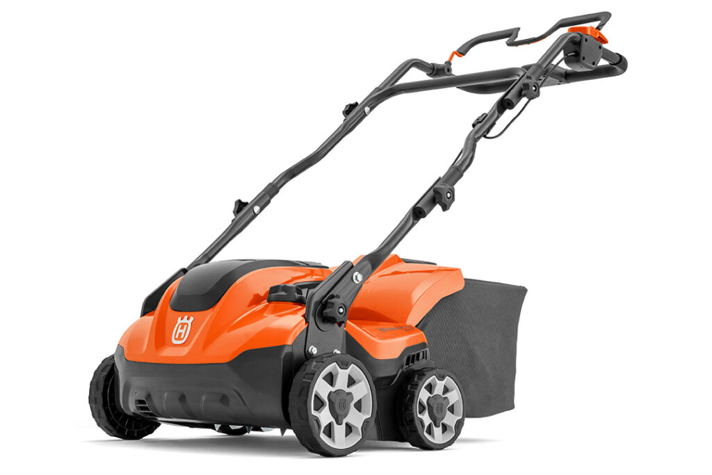 A Husqvarna S138i scarifier on a white background